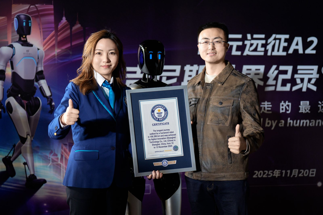NO钱包远征A2完成全球首次人形机器人百公里跨省行走，获吉尼斯世界纪录™认证！
